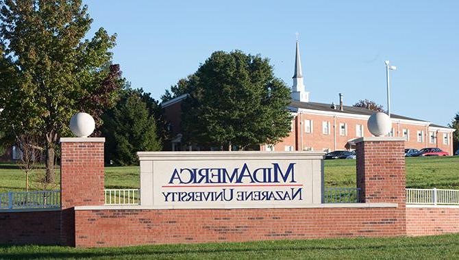 The East entrance to campus is flanked by two brick signs welcoming visitors to campus
